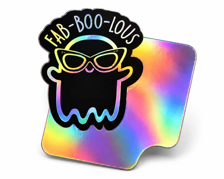A 'Fab-boo-lous' ghost sticker on a rainbow holographic sample card.